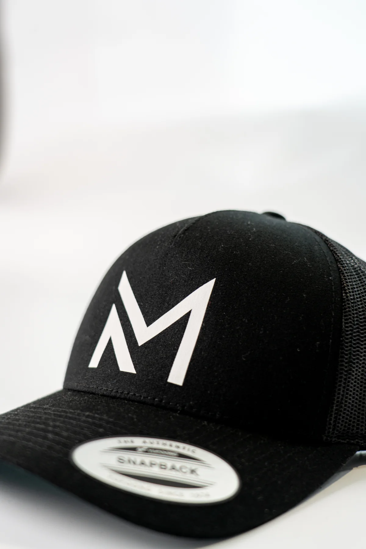 Schwarze Cap mit Makellos Logo
